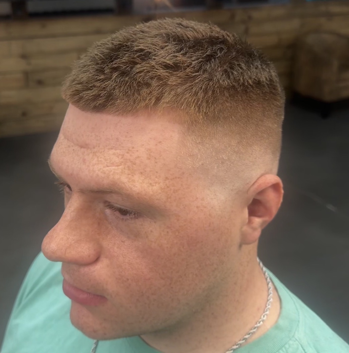 High skin fade with a short textured crop